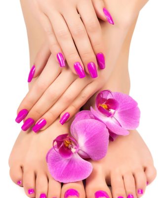 Relaxing pink manicure and pedicure with a orchid flower
